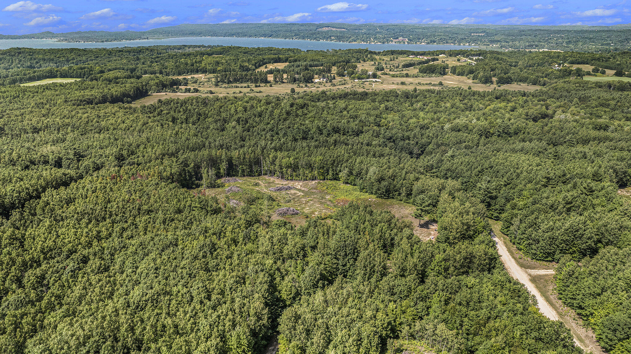 5858 Outback Ridge Manistee, MI 49660 - Photo 16 of 49 Beautiful wooded area near lakes
