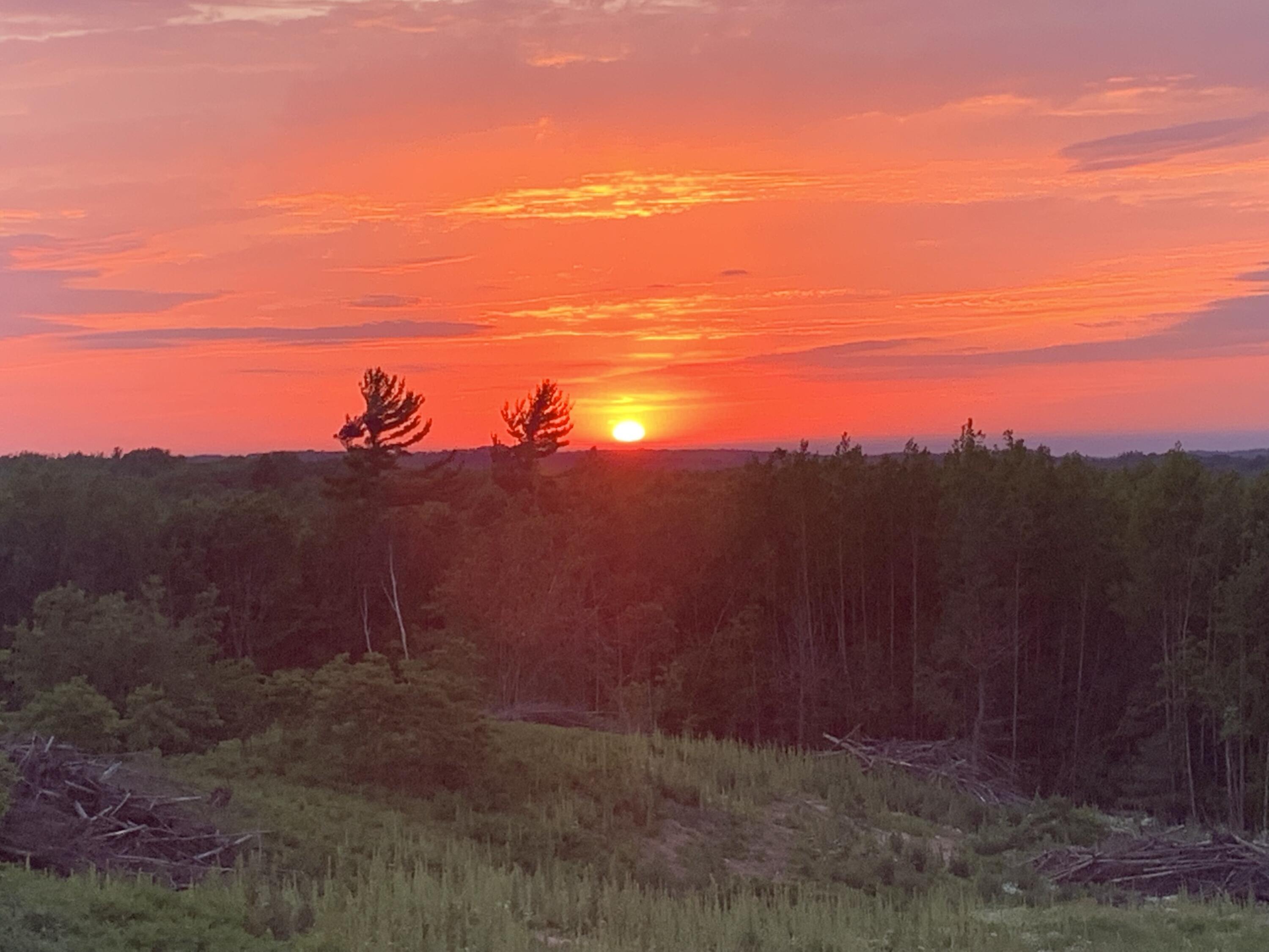 5858 Outback Ridge Manistee, MI 49660 - Photo 24 of 49 Sunset over Lake Michigan