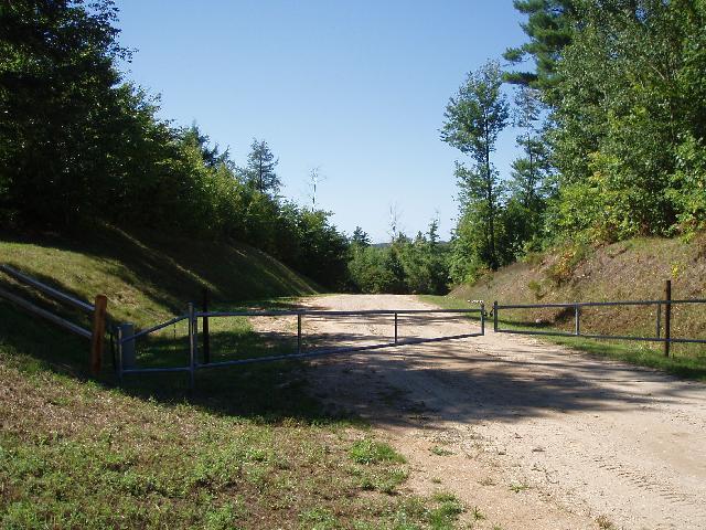 5858 Outback Ridge Manistee, MI 49660 - Photo 5 of 49 Gate entering this country development
