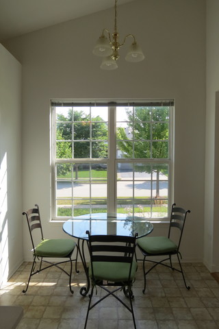 992 Oak Ridge Boulevard Elgin, IL 60120 - Photo 5 of 25 a view of a workspace with furniture and a window