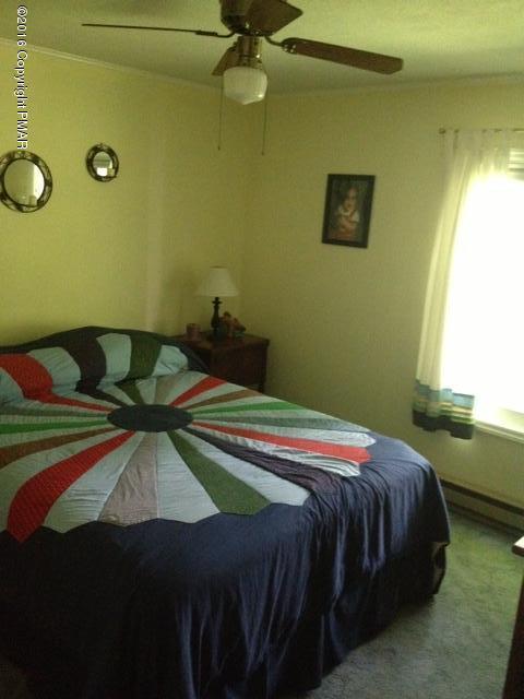 3113 Bear Road Bushkill, PA 18324 - Photo 23 of 38 a bedroom with a bed and a window
