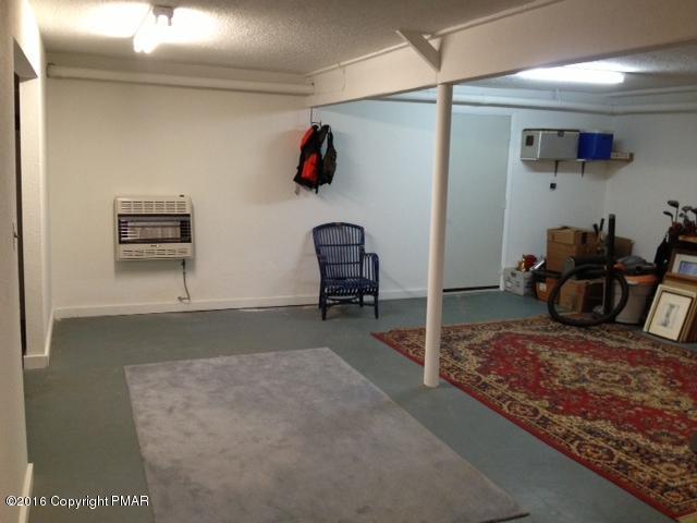 3113 Bear Road Bushkill, PA 18324 - Photo 29 of 38 a room with furniture and a rug