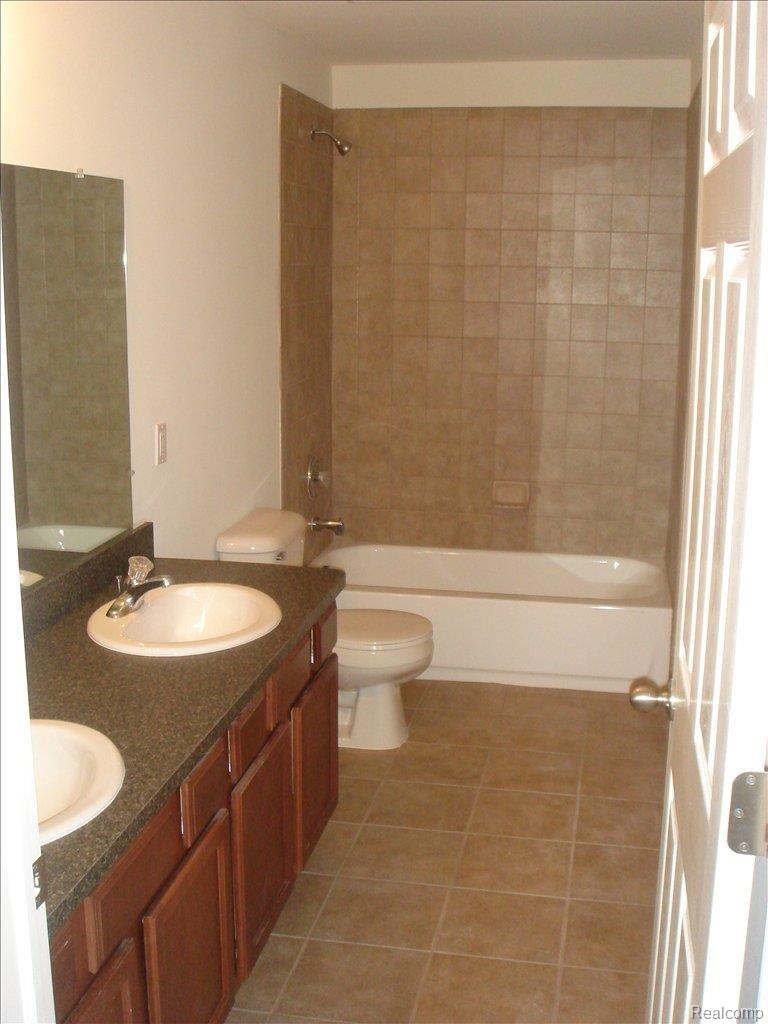6026 Biddle Street Romulus, MI 48174 - Photo 8 of 9 Double Sinks in Master Bath