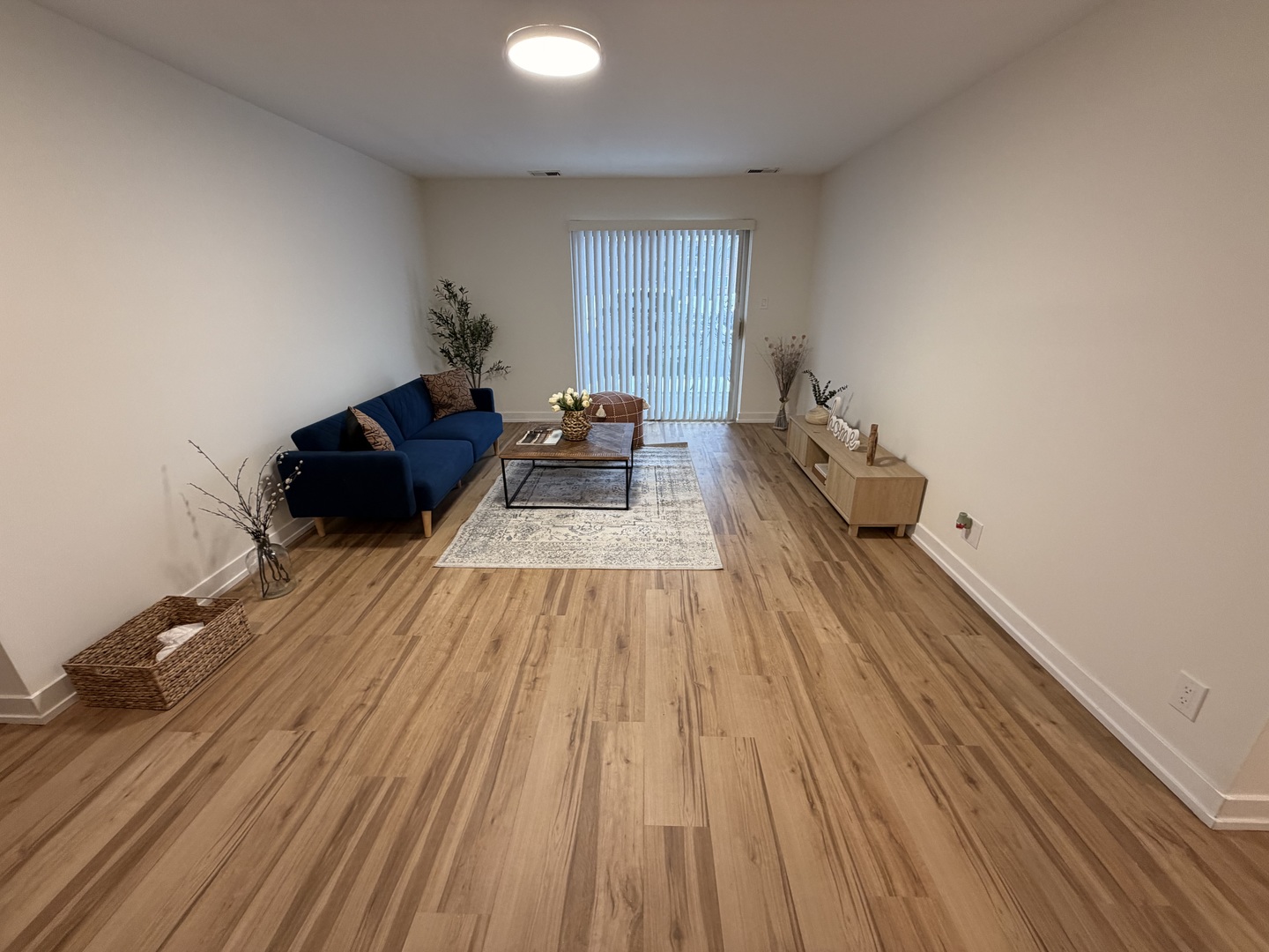 607 West Central Road, Unit A4 Mount Prospect, IL 60056 - Photo 3 of 13 a bed room with a bed and wooden floor