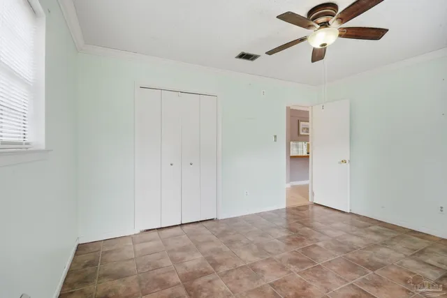 a view of a backyard with a sitting area