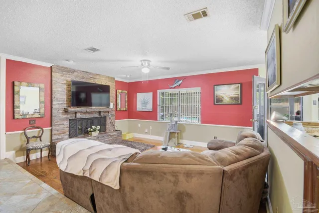 a bed room with a bed and a television