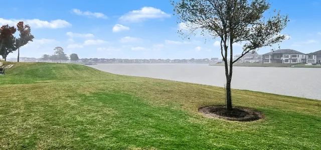 a view of a lake from a yard