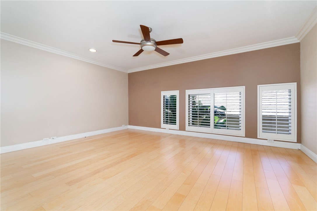 12206 Tunbridge Court Rancho Cucamonga, CA 91739 - Photo 11 of 34 a view of an empty room with wooden floor and a window