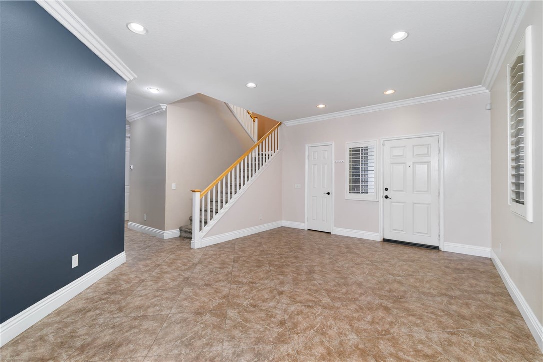 12206 Tunbridge Court Rancho Cucamonga, CA 91739 - Photo 2 of 34 a view of an entryway wooden floor and staircase