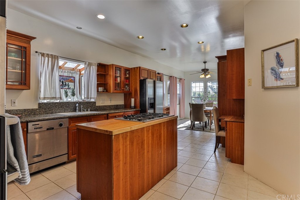 1608 Hill Drive Eagle Rock, CA 90041 - Photo 13 of 71 a kitchen with stainless steel appliances granite countertop a stove and a sink