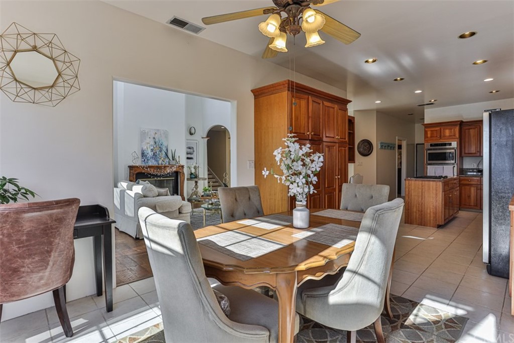 1608 Hill Drive Eagle Rock, CA 90041 - Photo 18 of 71 a view of a dining room with furniture a chandelier and wooden floor