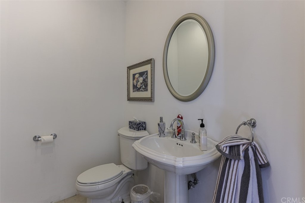 1608 Hill Drive Eagle Rock, CA 90041 - Photo 20 of 71 a bathroom with a toilet a sink and a mirror