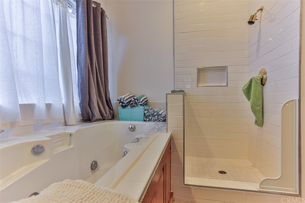 1608 Hill Drive Eagle Rock, CA 90041 - Photo 27 of 71 a bathroom with a tub and a shower
