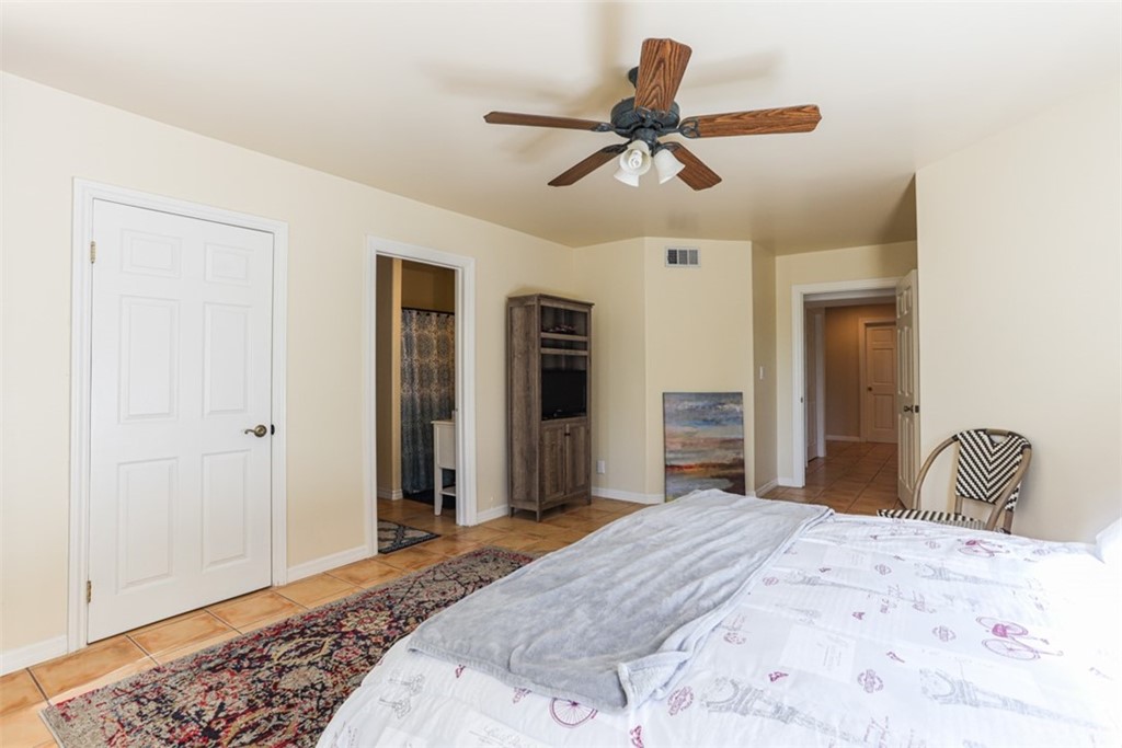 1608 Hill Drive Eagle Rock, CA 90041 - Photo 52 of 71 a bedroom with a bed and a dresser