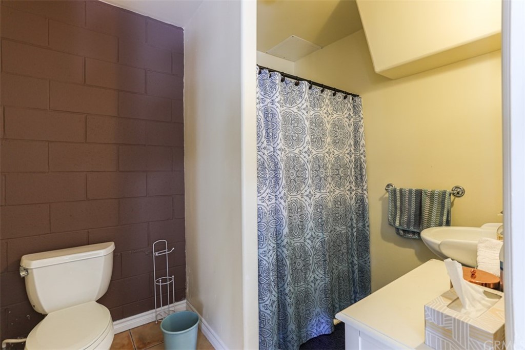 1608 Hill Drive Eagle Rock, CA 90041 - Photo 53 of 71 a bathroom with a toilet a sink and a shower