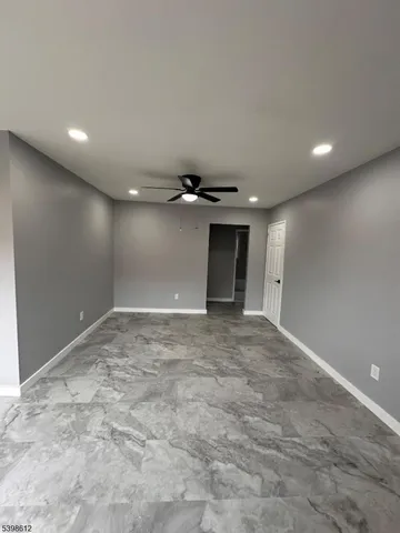 a kitchen with stainless steel appliances a stove a sink and a refrigerator