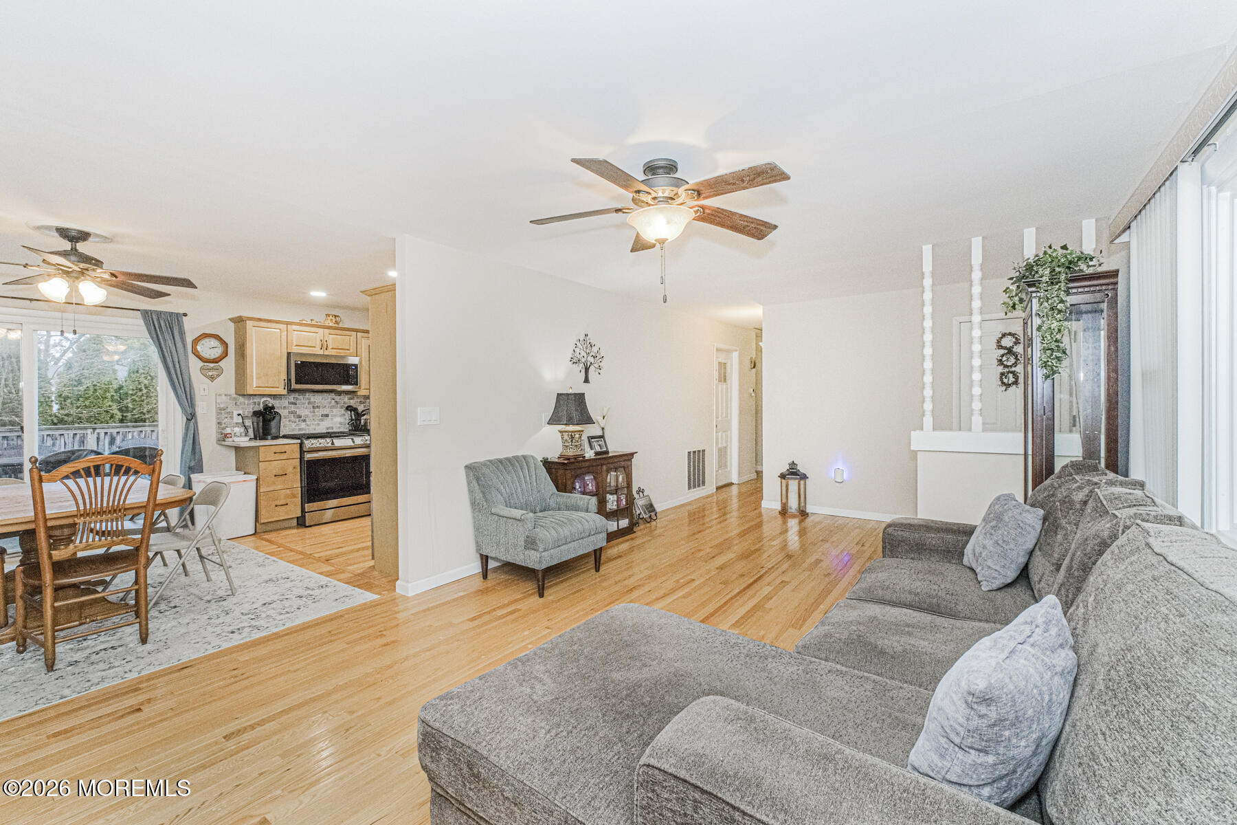 237 Pine Tree Drive Brick, NJ 08723 - Photo 15 of 24 a bedroom with a bed window and chairs