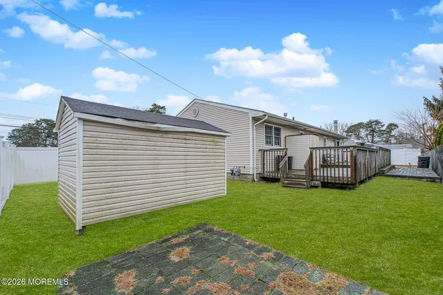 a view of a backyard with a garden