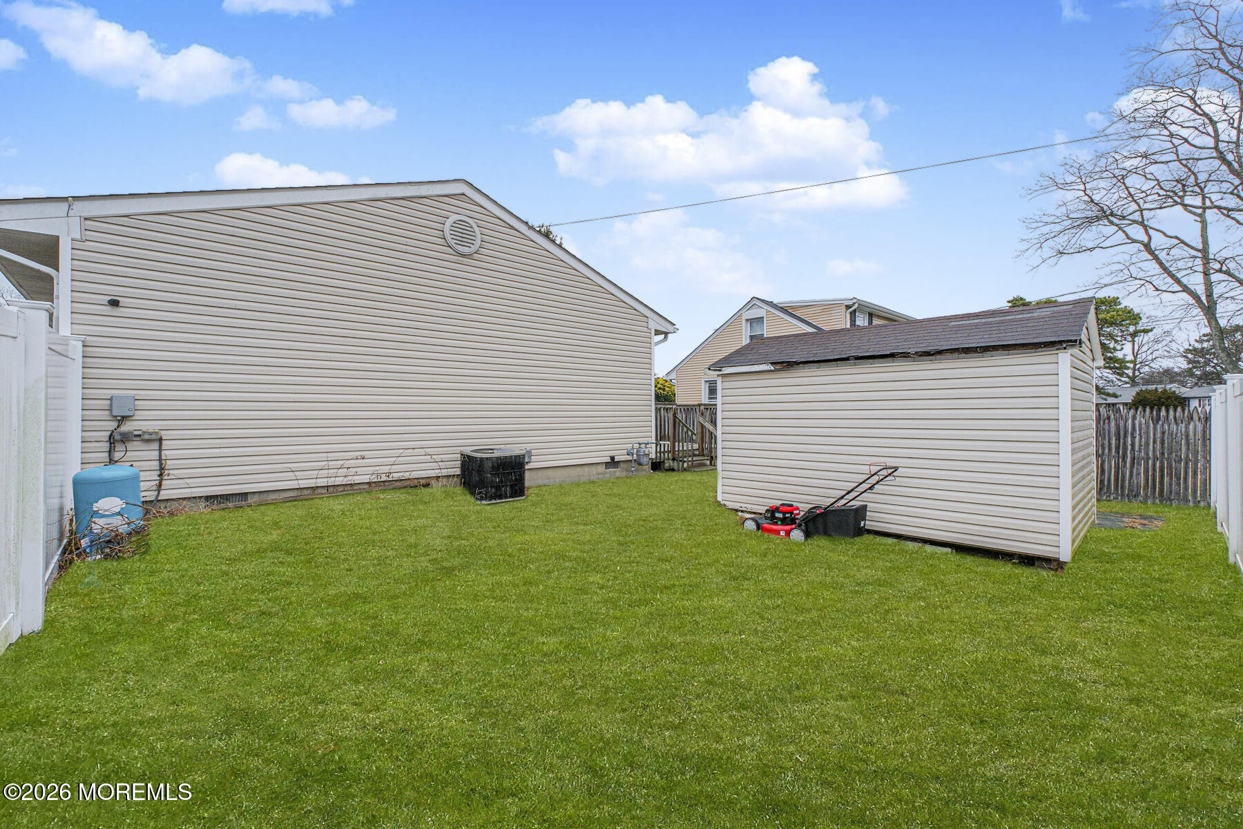 237 Pine Tree Drive Brick, NJ 08723 - Photo 24 of 24 a view of a backyard of the house