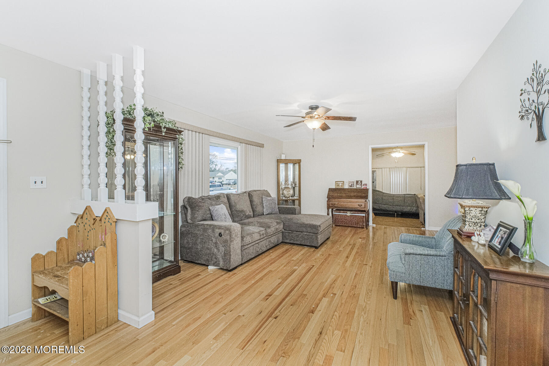 237 Pine Tree Drive Brick, NJ 08723 - Photo 3 of 24 a living room with furniture and a wooden floor