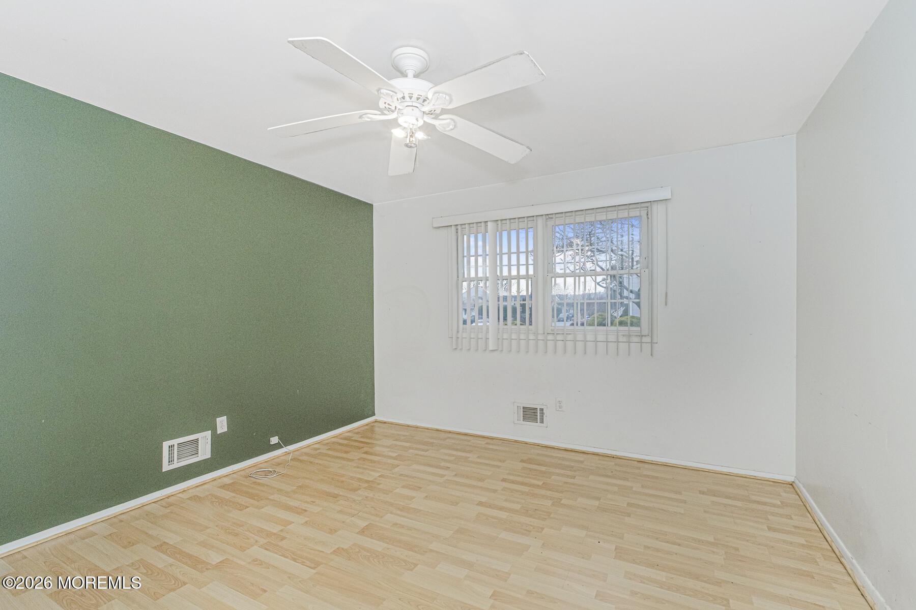 237 Pine Tree Drive Brick, NJ 08723 - Photo 9 of 24 a view of a big room with wooden floor and windows in a room