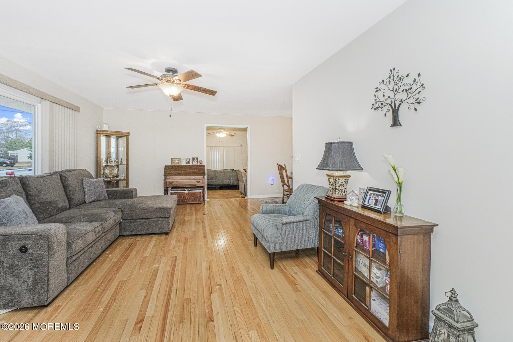 237 Pine Tree Drive Brick, NJ 08723 - Photo 9 of 24 a living room with furniture and a fireplace