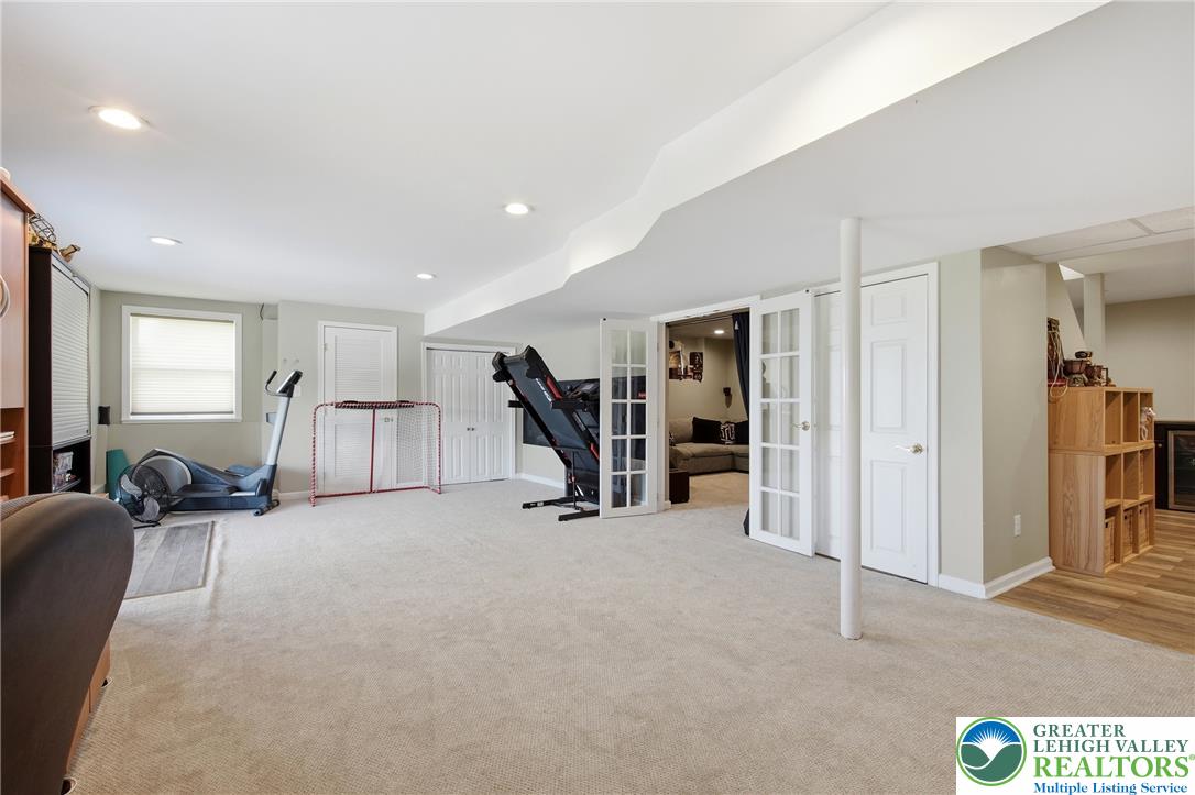 115 West Butternut Road Hellertown, PA 18055 - Photo 58 of 97 A spacious, finished lower level offers versatile areas for recreation or exercise.