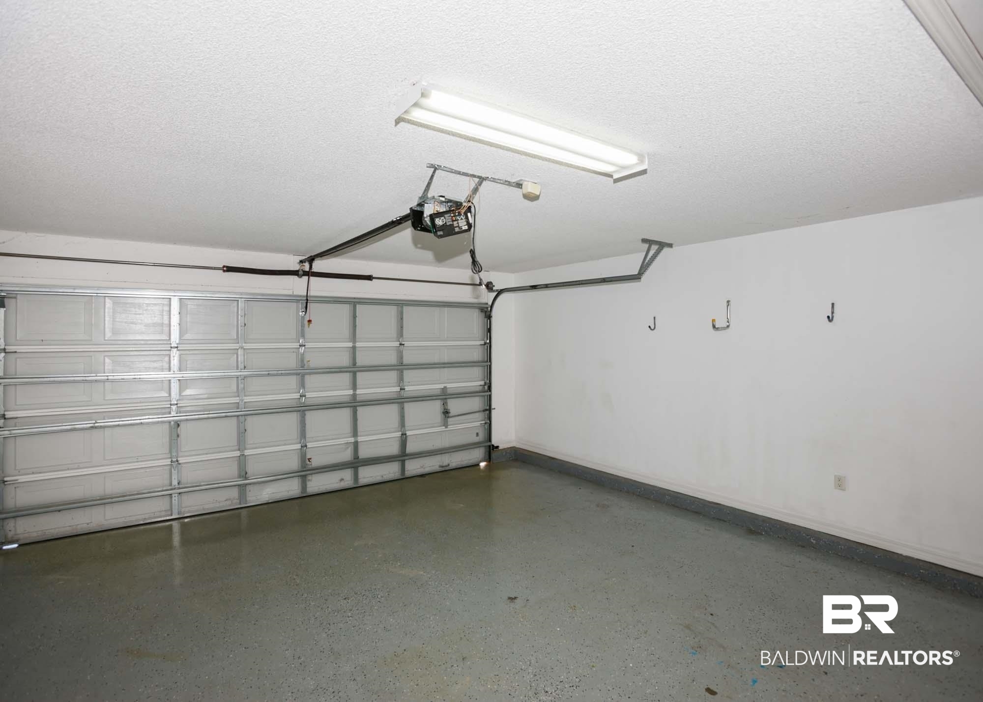 2530 Ashburn Lane Foley, AL 36535 - Photo 44 of 46 Garage with a garage door opener