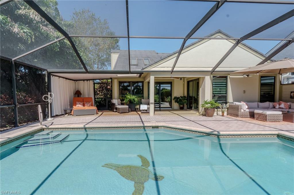 11737 Quail Village Way Naples, FL 34119 - Photo 37 of 50 a view of a entryway door front of house