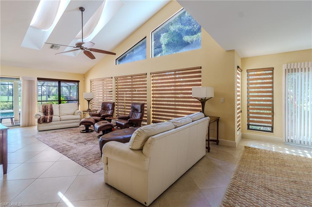 11737 Quail Village Way Naples, FL 34119 - Photo 4 of 50 a living room with furniture and a window