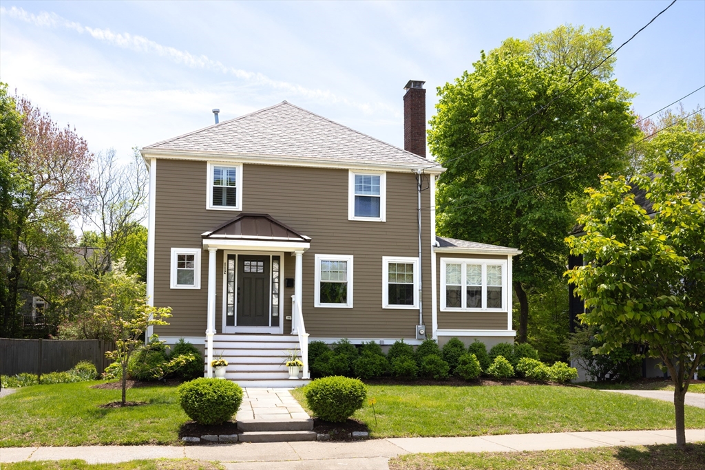 112 Oakdale Road Newton, MA 02461 - Photo 1 of 14 a front view of a house with a yard