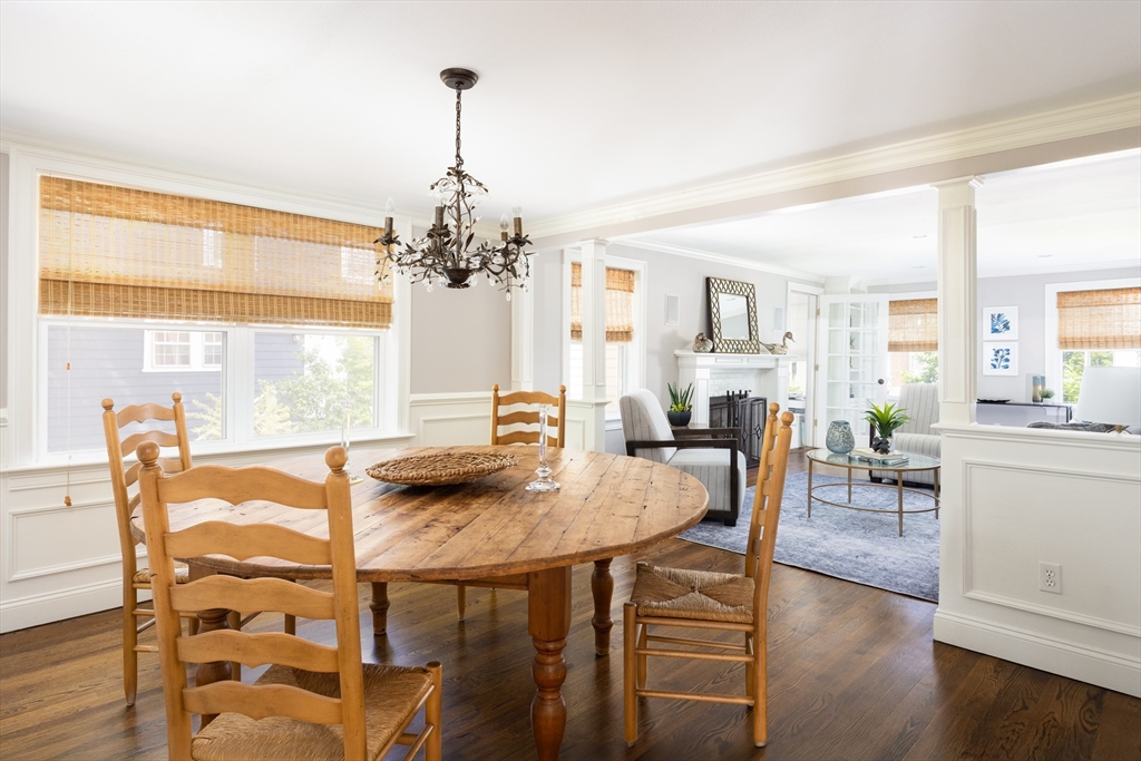 112 Oakdale Road Newton, MA 02461 - Photo 6 of 14 a view of a dining room with furniture wooden floor and chandelier