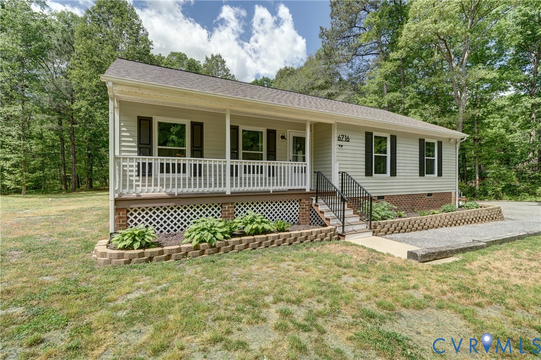 6716 Church Road Petersburg, VA 23803 - Photo 3 of 44 a front view of a house with a yard