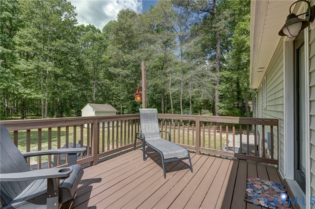 6716 Church Road Petersburg, VA 23803 - Photo 42 of 44 a view of balcony with wooden floor and fence