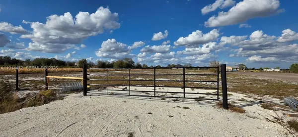 a view of a backyard of the house