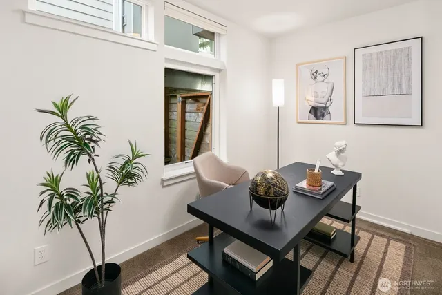 a bathroom with a sink a toilet and shower curtain