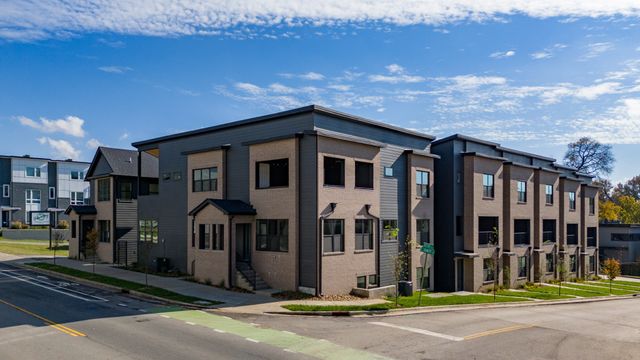 a front view of a building with street