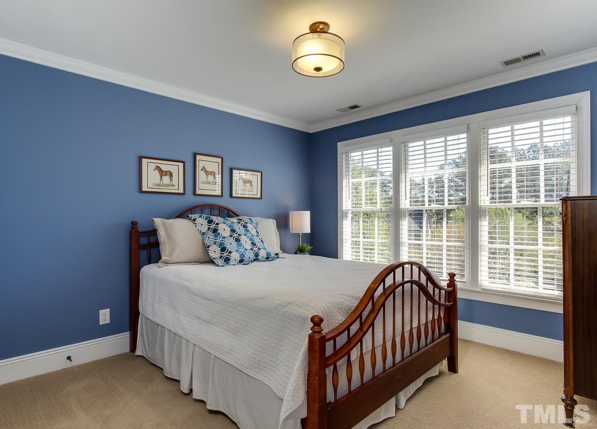 7260 Manor Oaks Drive Raleigh, NC 27615 - Photo 18 of 25 This bedroom has nice sized closet and opens to beautiful new buddy bath.