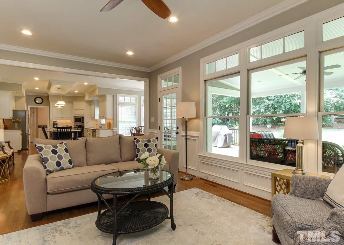 7260 Manor Oaks Drive Raleigh, NC 27615 - Photo 25 of 25 Another view of family room looking into kitchen. Large open floor plan is great for entertaining and having the family all together.