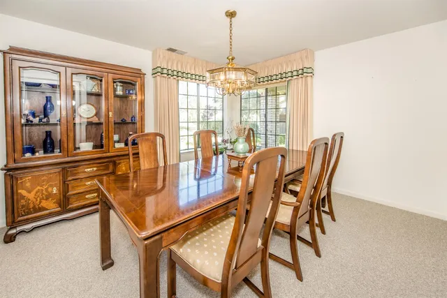 a view of a livingroom with furniture and front door