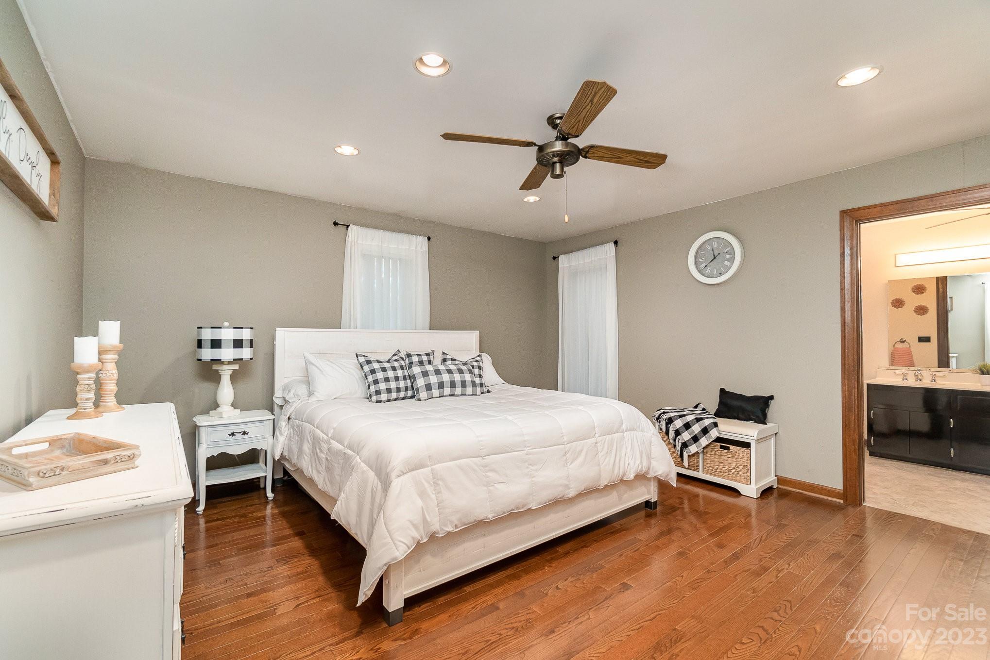 31 Robinwood Drive Midland, NC 28107 - Photo 14 of 33 a bedroom with a bed and a table