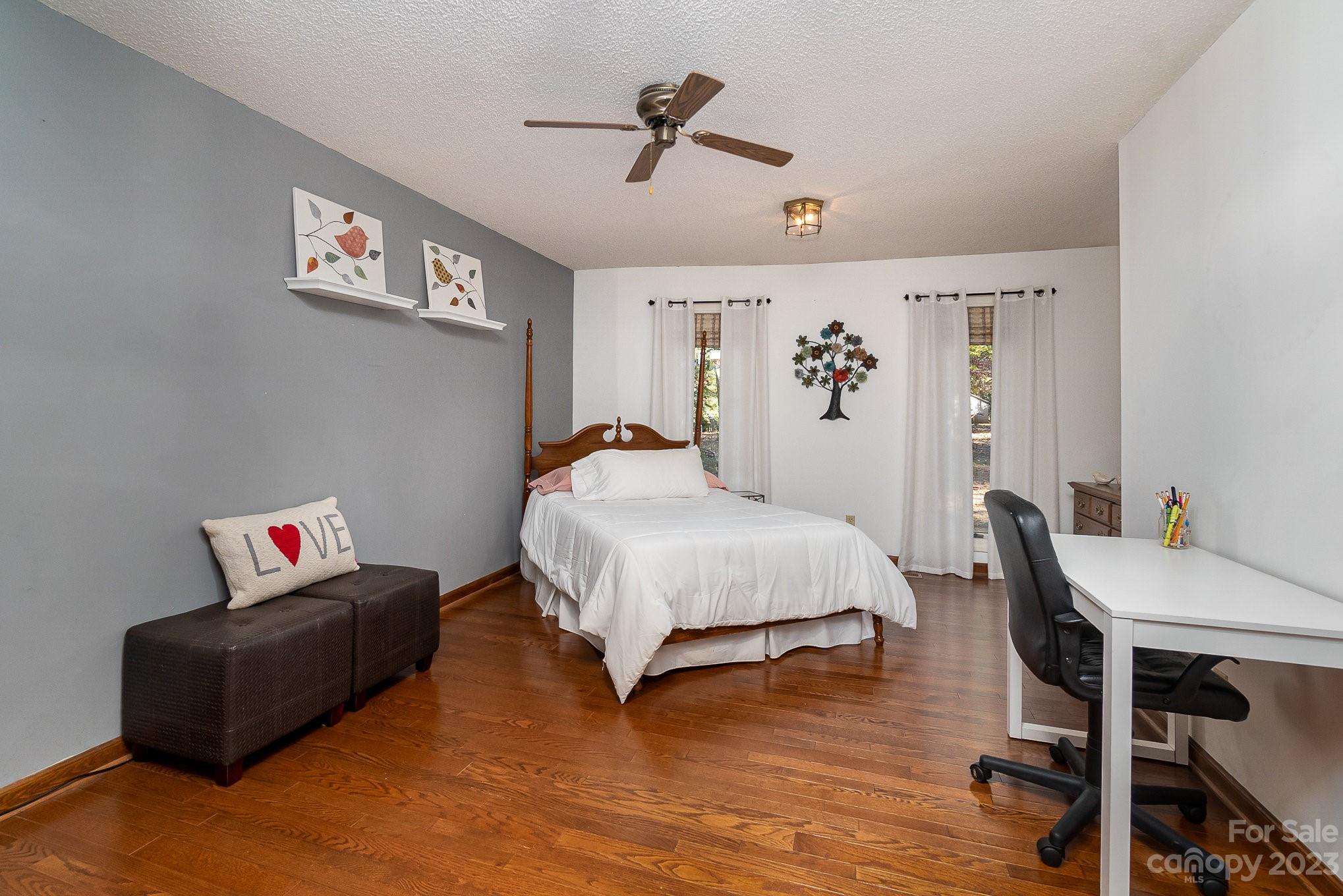31 Robinwood Drive Midland, NC 28107 - Photo 16 of 33 a bedroom with a bed and a table in it