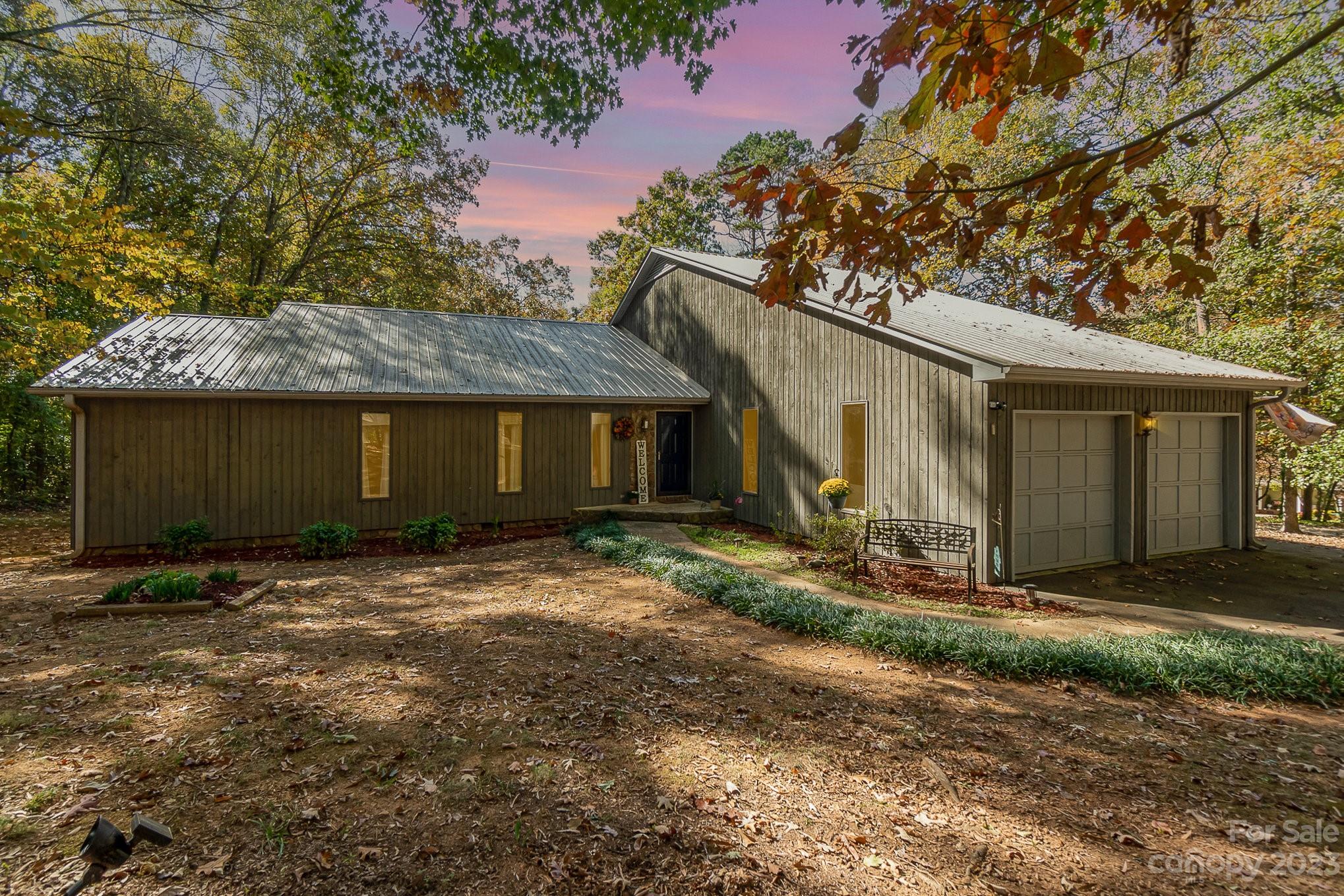 31 Robinwood Drive Midland, NC 28107 - Photo 27 of 33 a view of a house with a yard