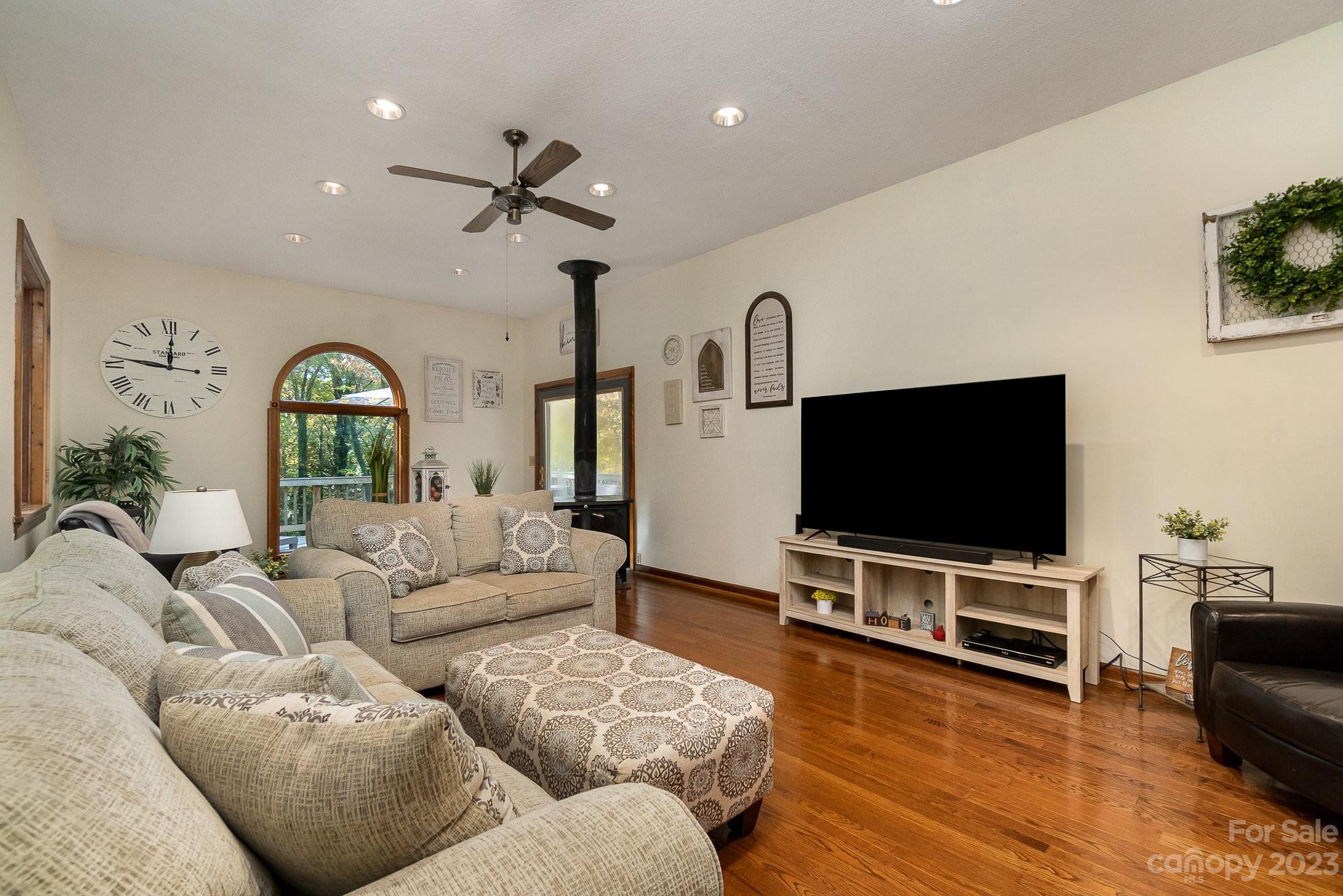 31 Robinwood Drive Midland, NC 28107 - Photo 8 of 33 a living room with furniture and a flat screen tv