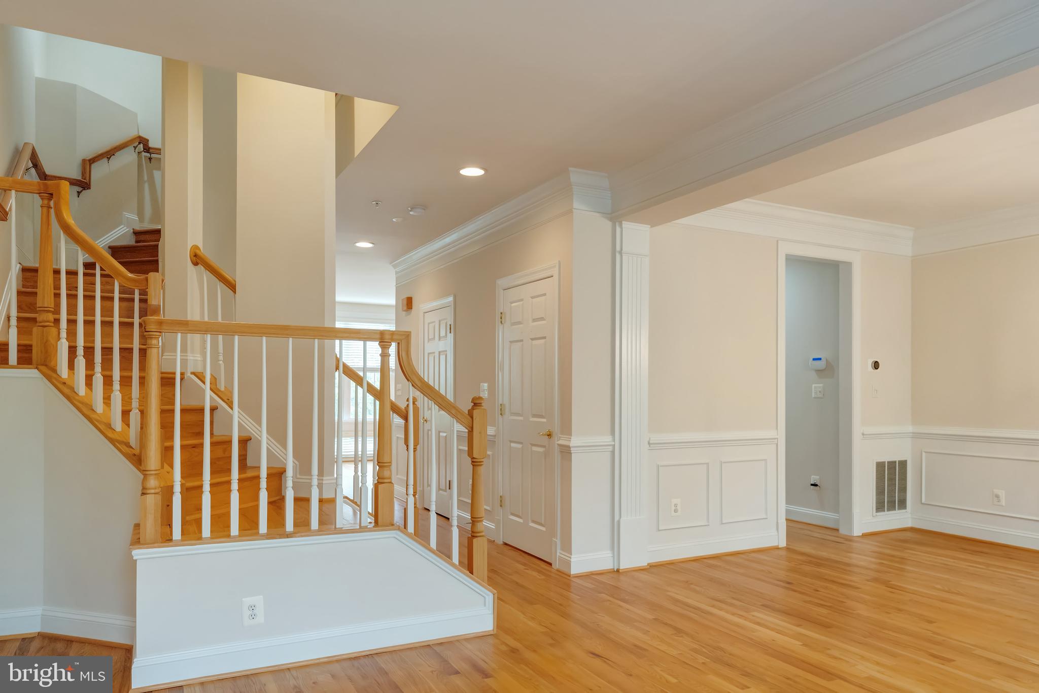 12121 Kinsley Place Reston, VA 20190 - Photo 4 of 45 Living Room with Crown Molding