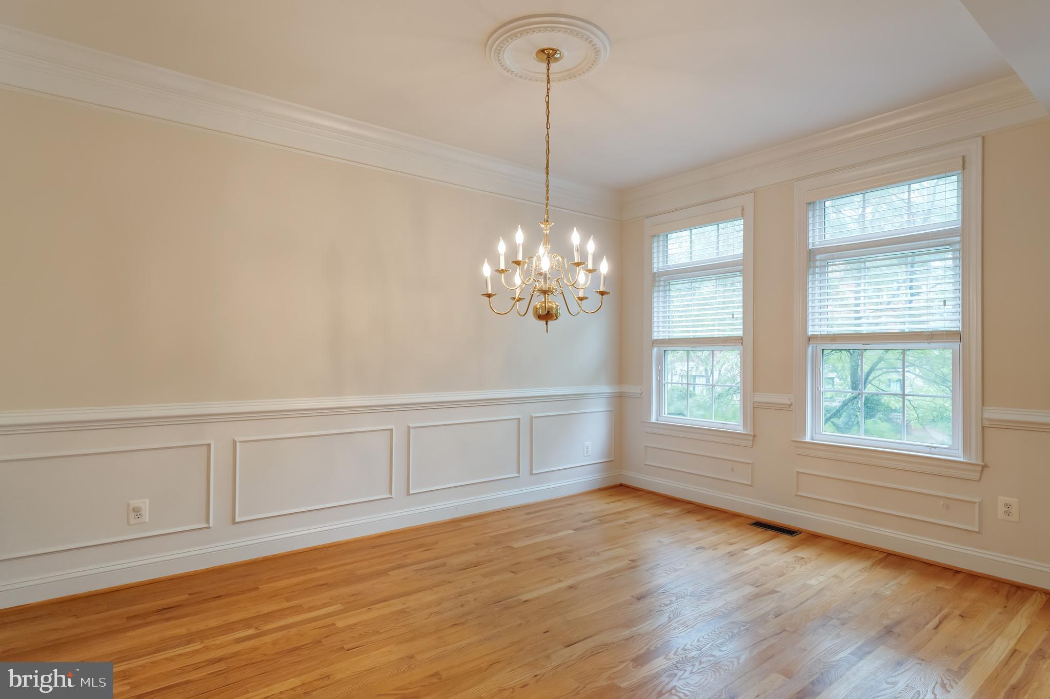 12121 Kinsley Place Reston, VA 20190 - Photo 5 of 45 Dining Room with Wainscoting and Chair Rail