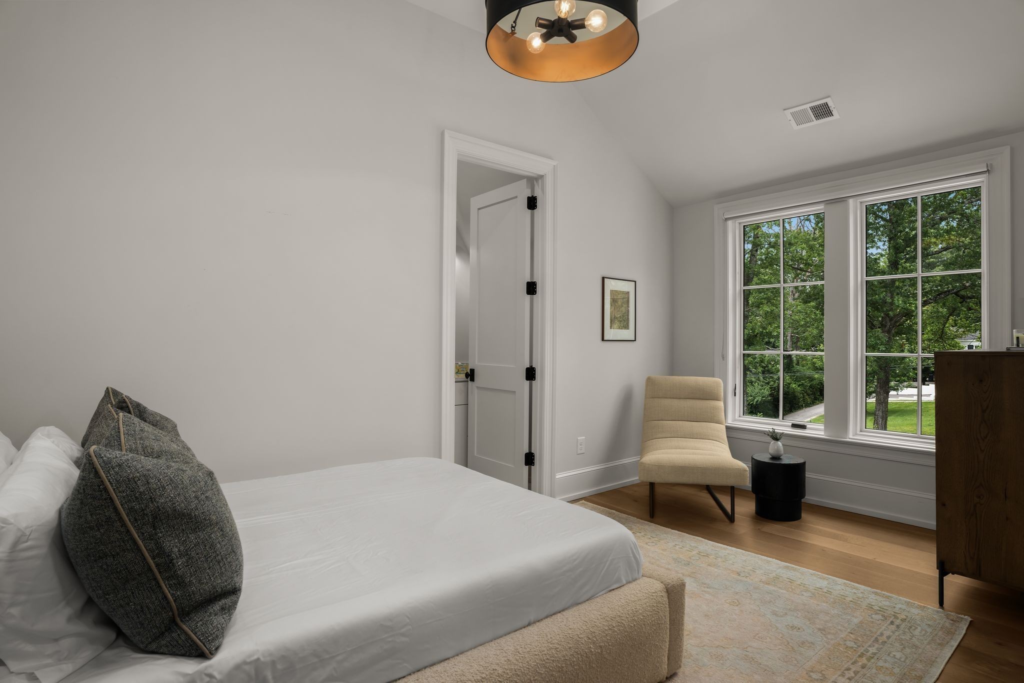 4301 Estes Road Nashville, TN 37215 - Photo 25 of 65 a bedroom with a bed and a large window