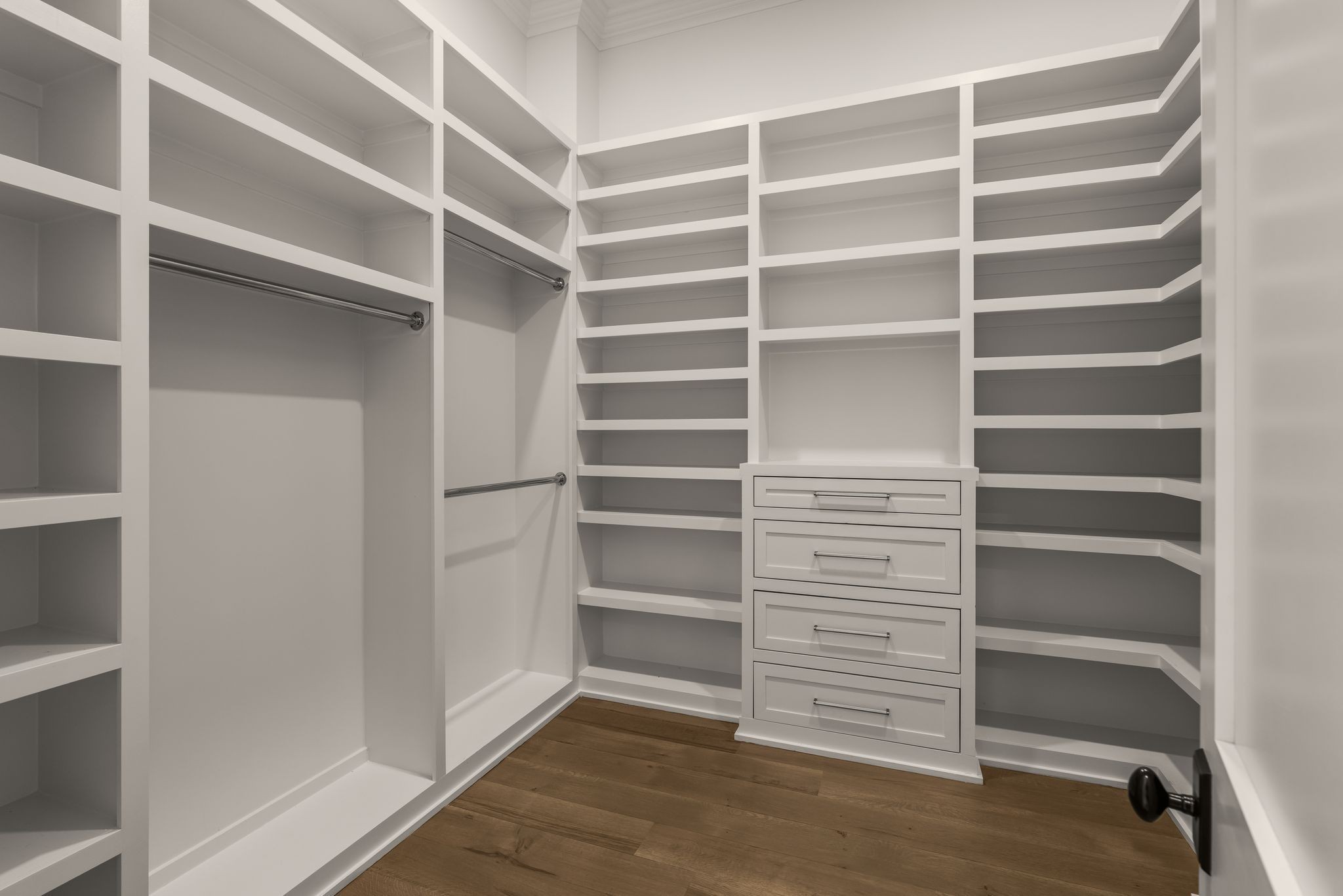 4301 Estes Road Nashville, TN 37215 - Photo 40 of 65 a view of walk in closet with empty racks