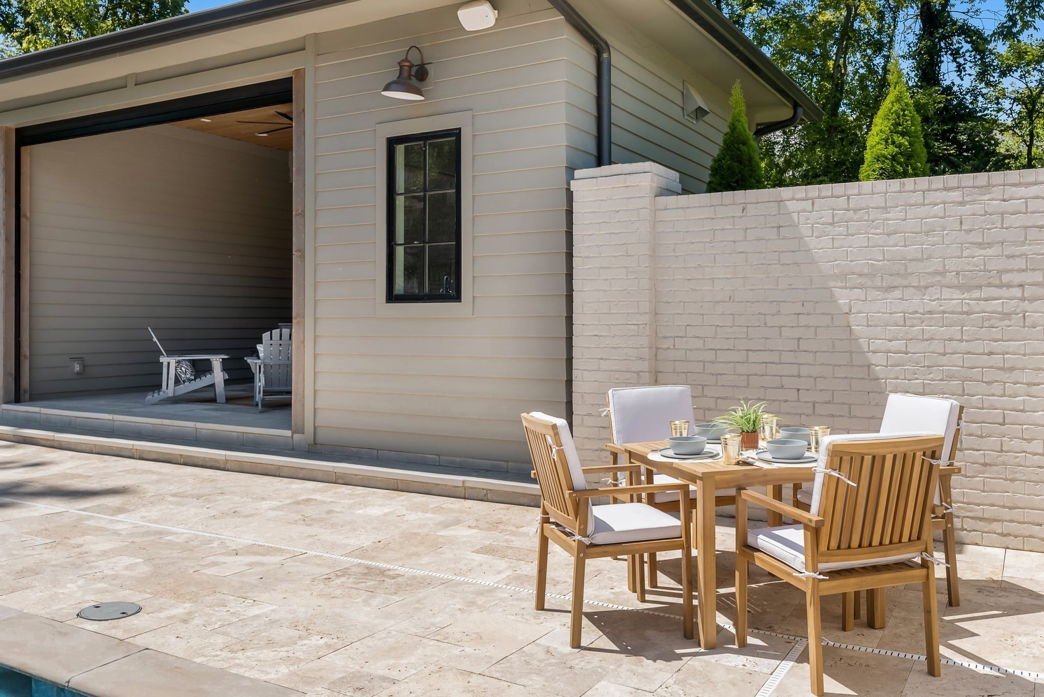 4301 Estes Road Nashville, TN 37215 - Photo 56 of 65 a view of a patio with table and chairs and potted plants