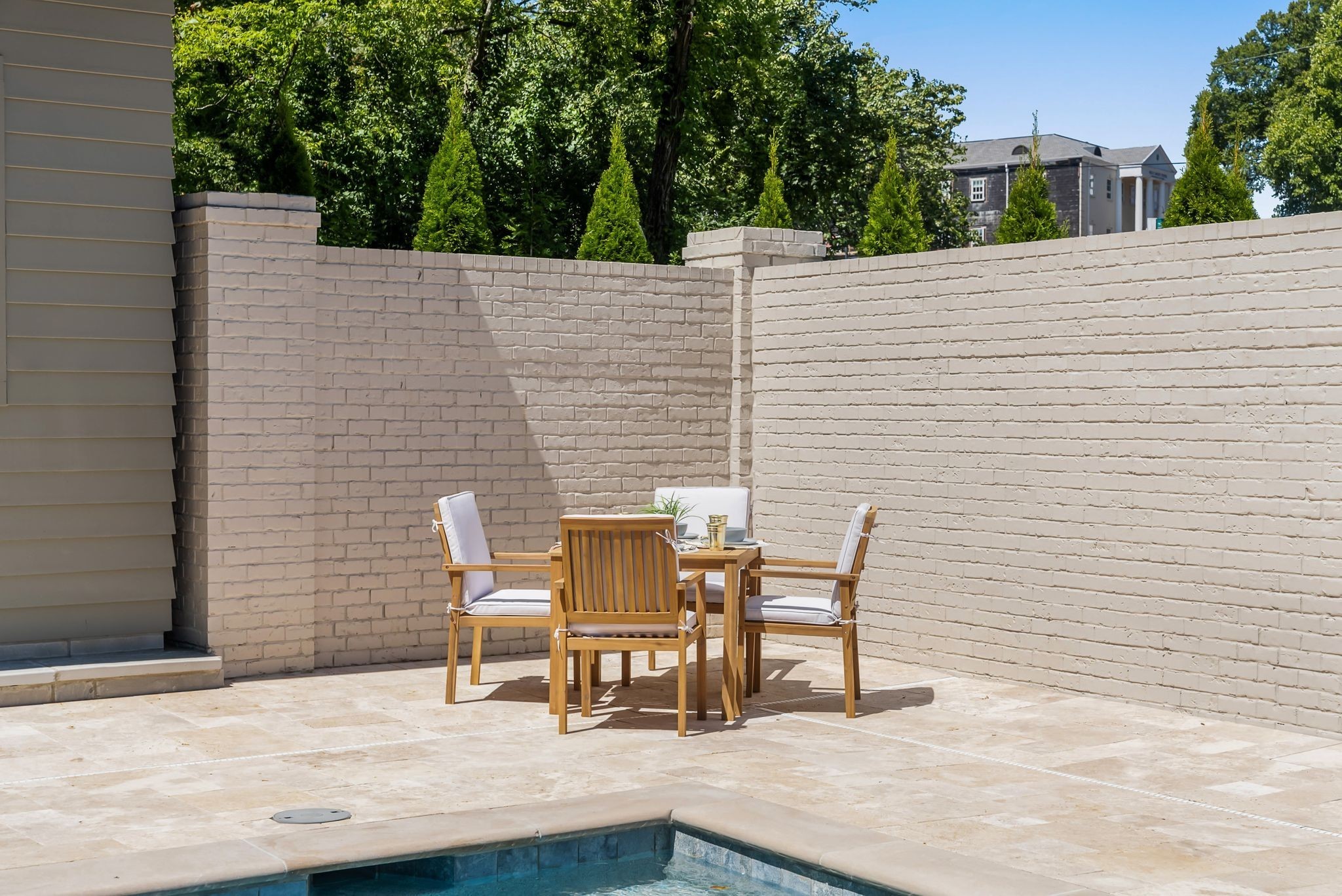 4301 Estes Road Nashville, TN 37215 - Photo 57 of 65 a view of a patio with table and chairs with wooden floor and fence
